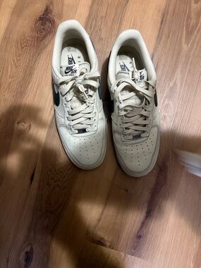 Nike Air Force 1 Low Sneakers - Cream with Black Swoosh
